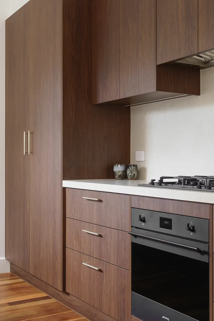 Timber kitchen joinery with integrated oven by MNA Builds