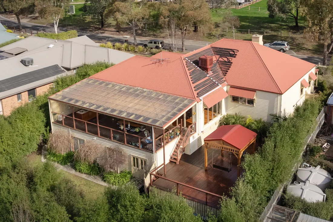 Aerial view of the property and deck by MNA Builds